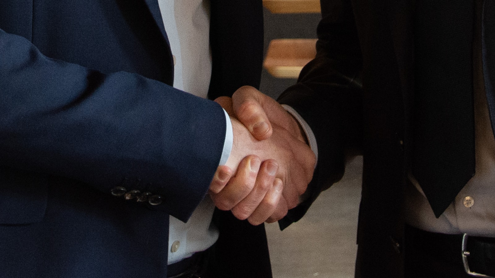 Two business partners shaking hands